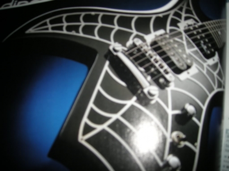 spider-web-guitar-882364037ede83bb83d79b443f4647c368a891f5